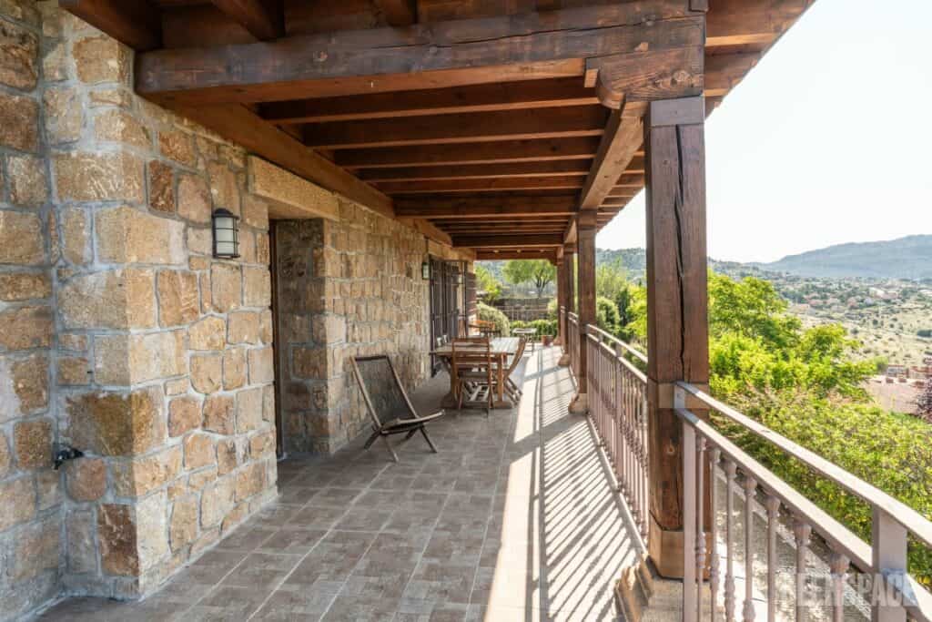 stone house with mountain views