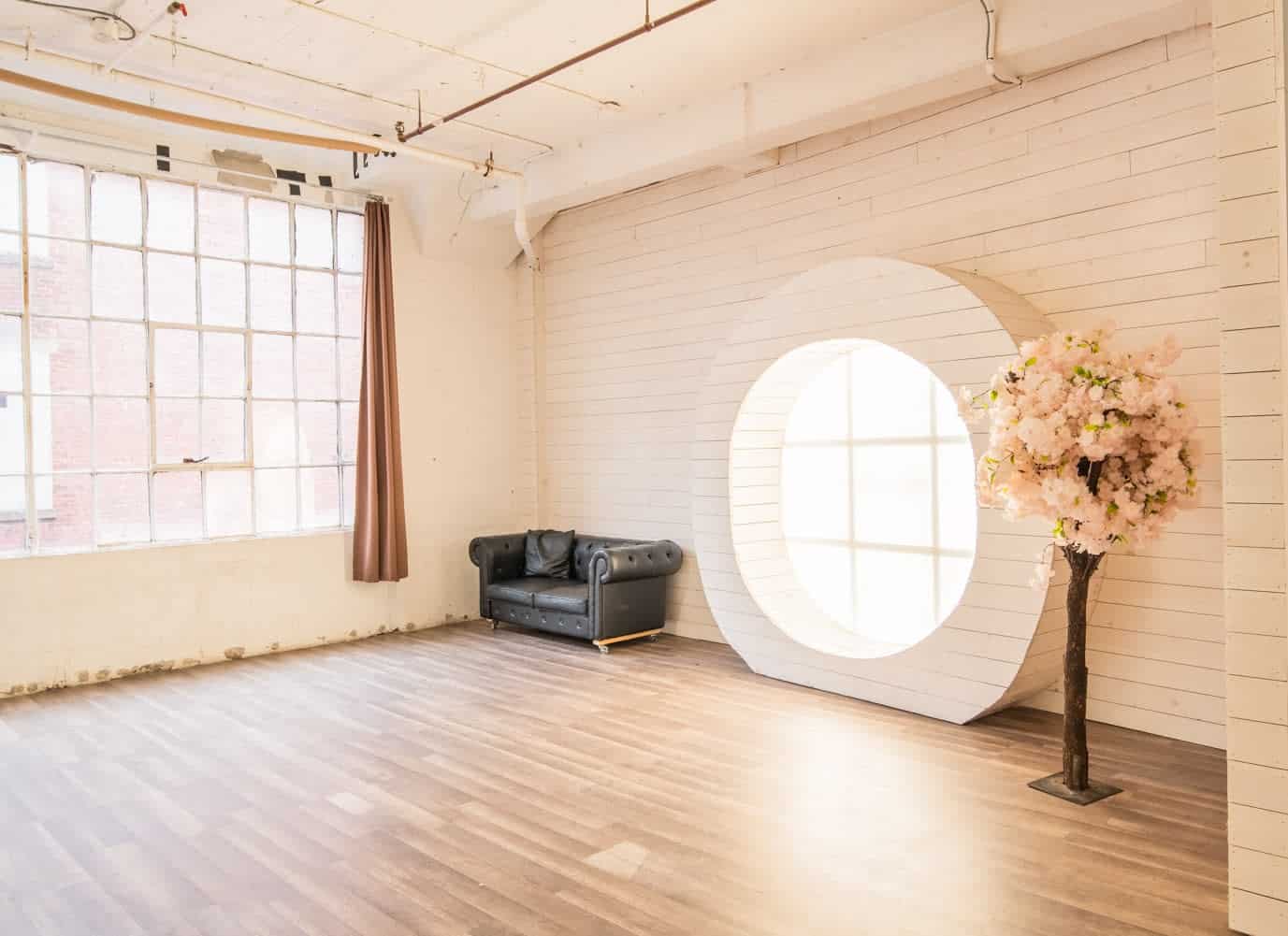 Beautiful Photo Studio with Large Round Wood Window nyc rental