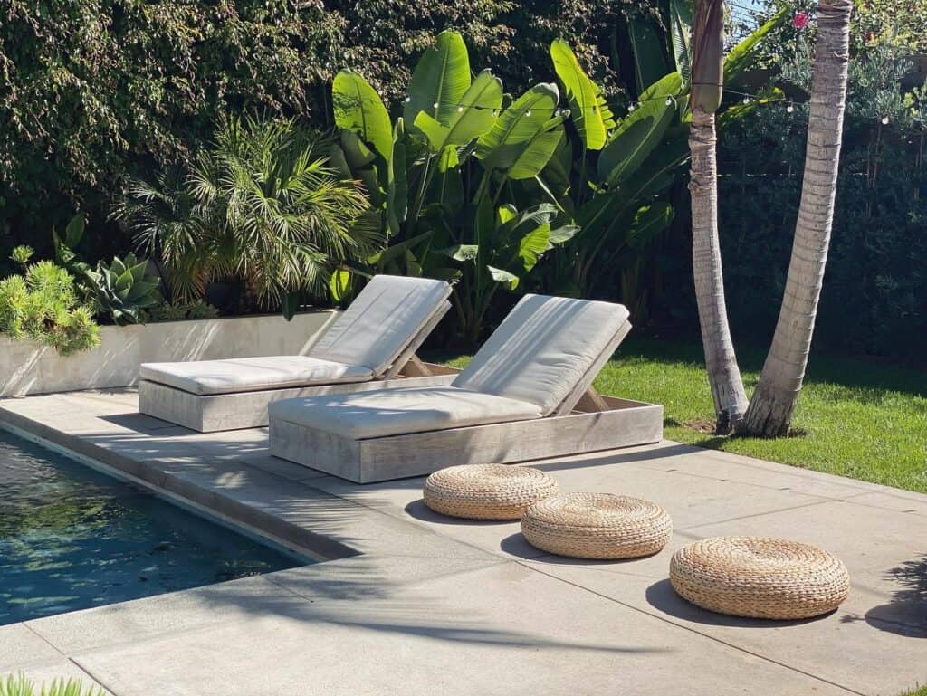 Elegant Poolside With Stylish Furniture in a Lush Garden santa monica rental