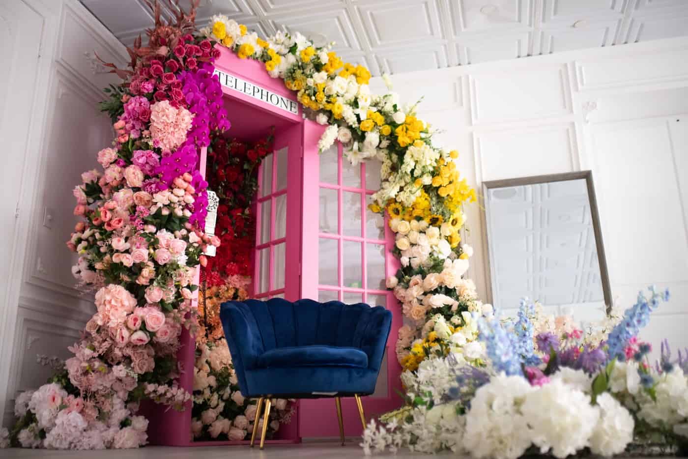 Naturally Lit Elegant White room With 3 Spring Floral Setups toronto rental