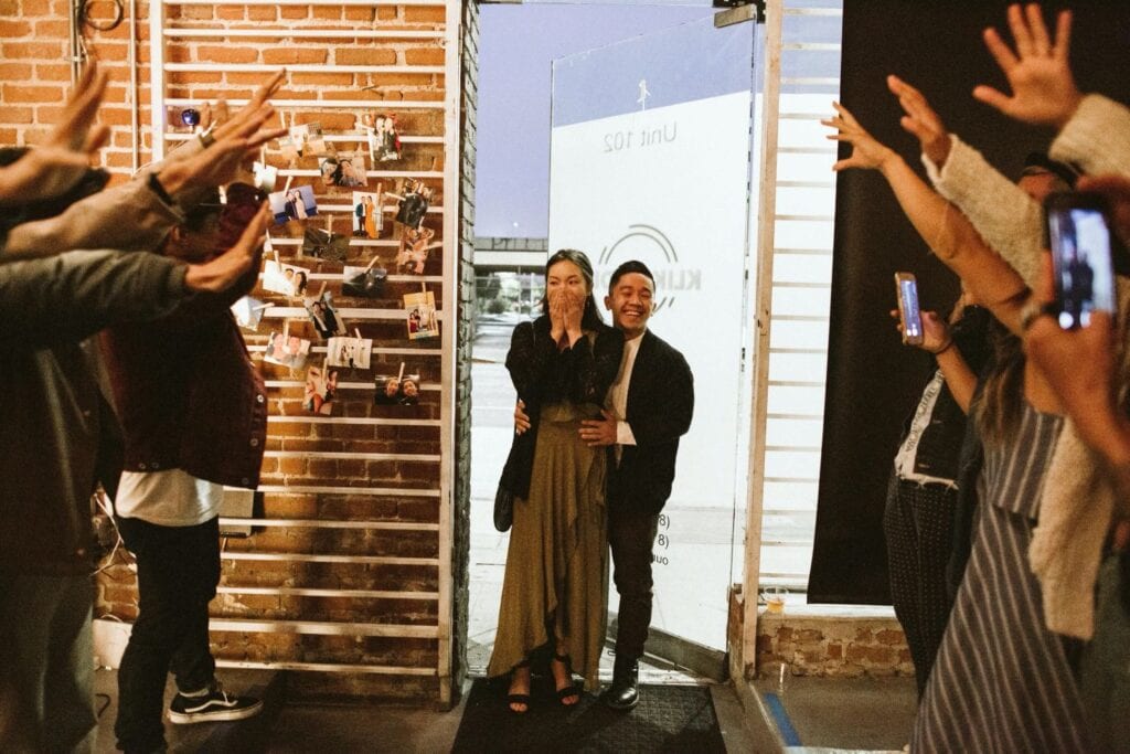 a surprise proposal at an event space