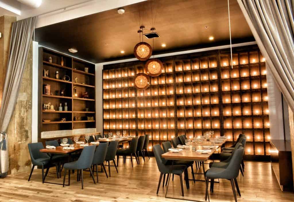 an elegant restaurant with warm lighting