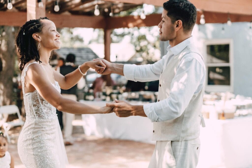 Couple dancing together at outside Charlotte wedding