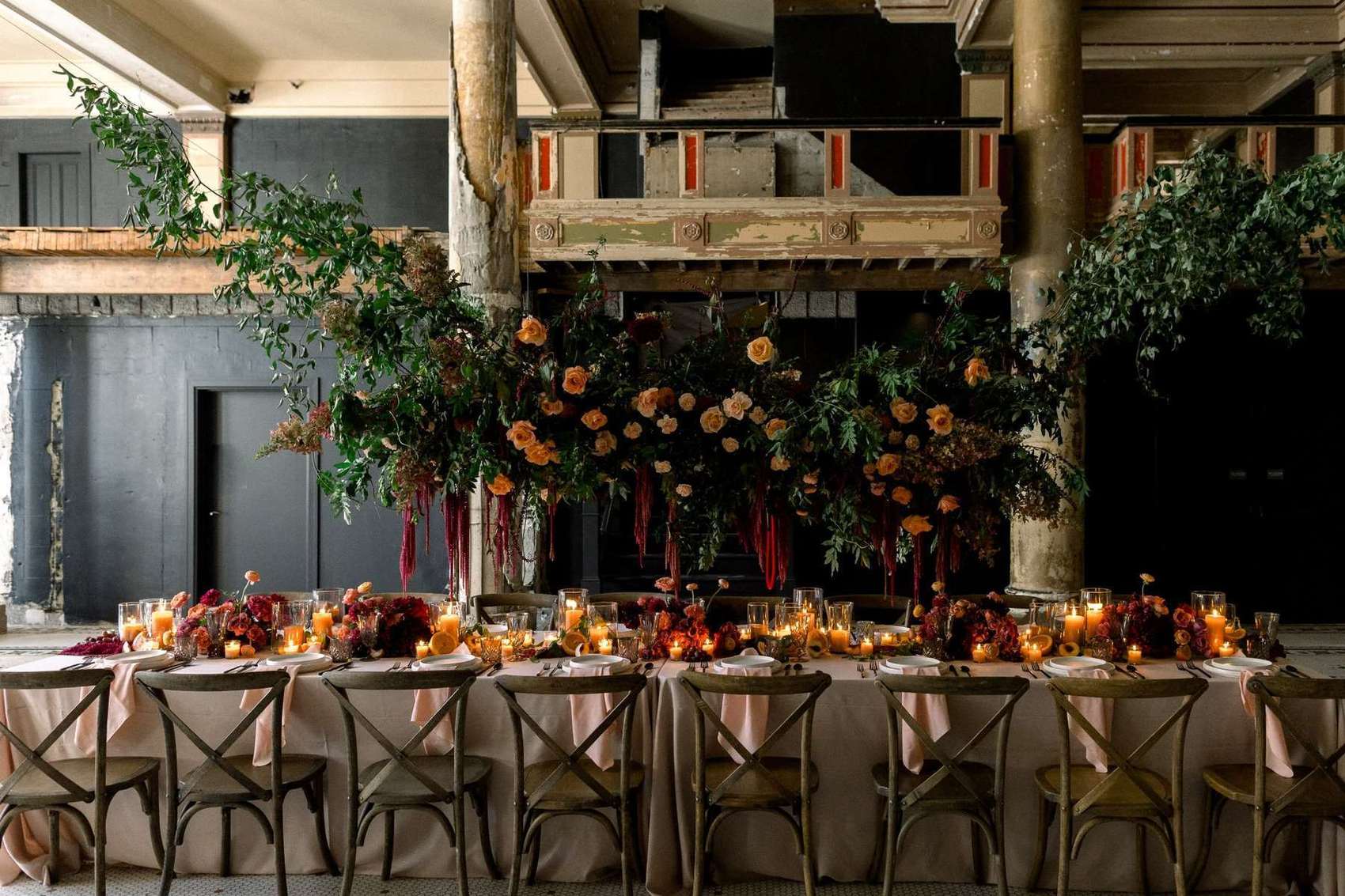 Lavish floral dining setup at a rustic industrial Cincinnati wedding venue