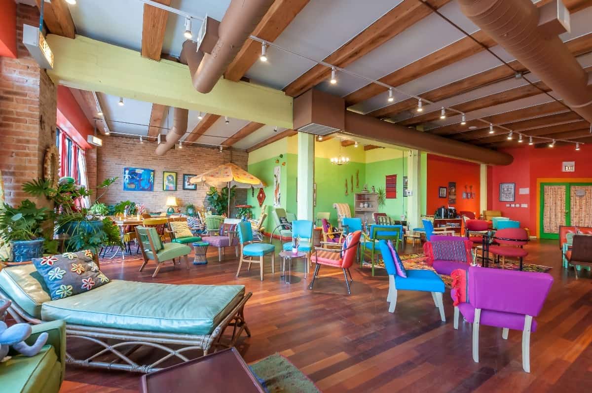 West Loop loft with vibrant colors and vintage furniture chicago rental