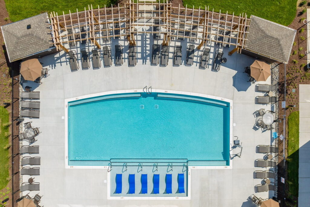 Aerial photo of a pool in Nashville, TN, surrounded by lounge chairs