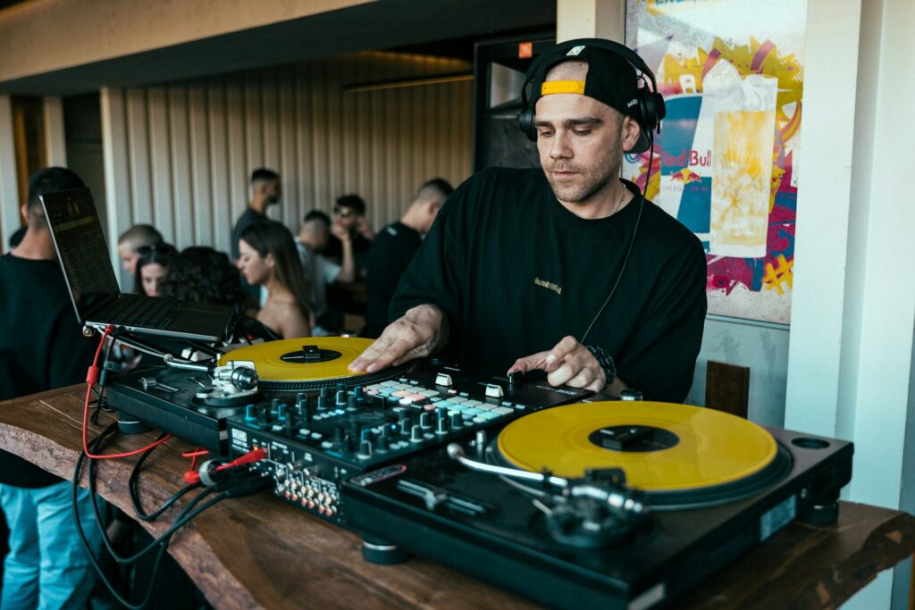 DJ spinning a turn table at a divorce party