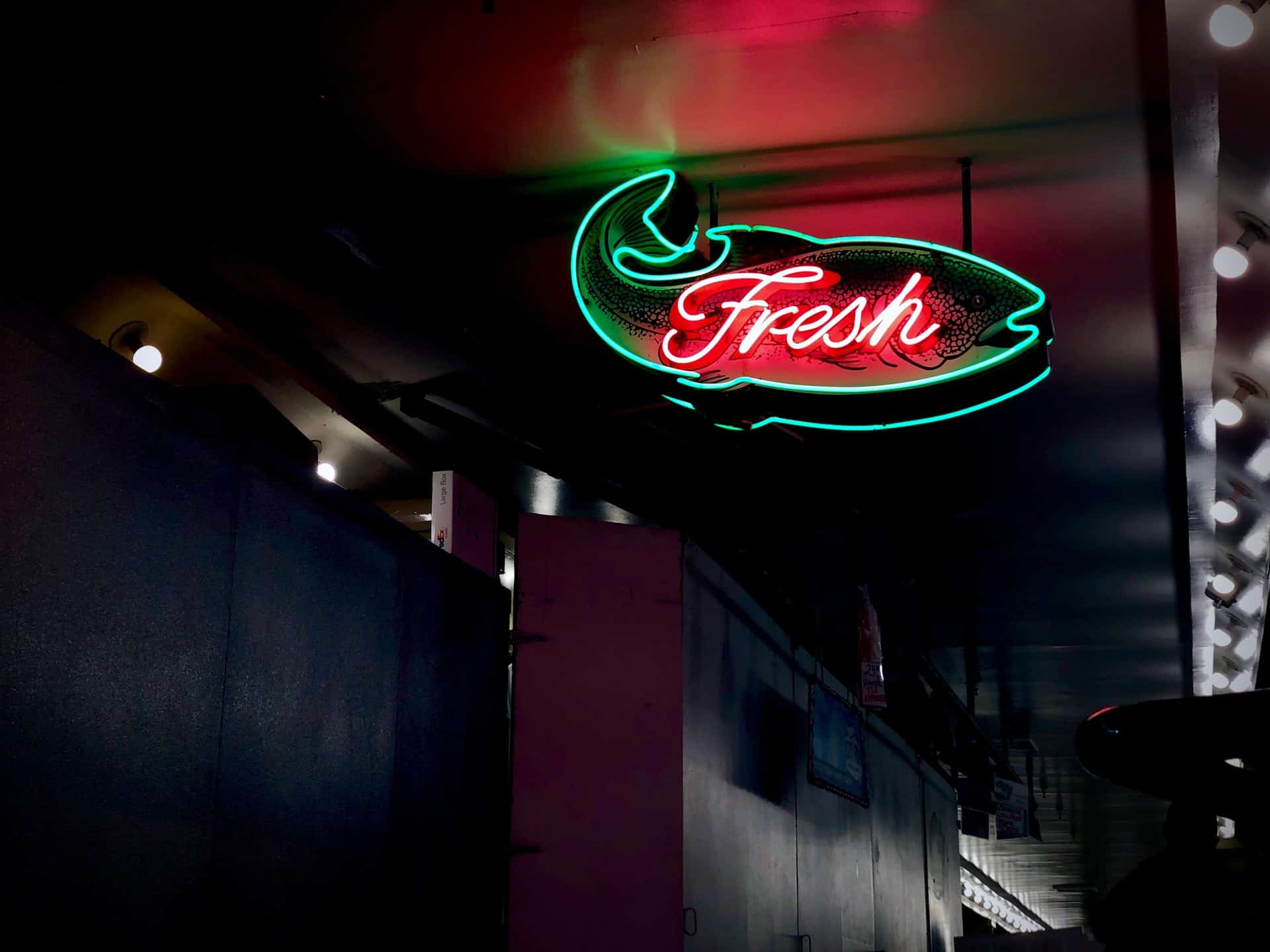 neon sign that reads "fresh"