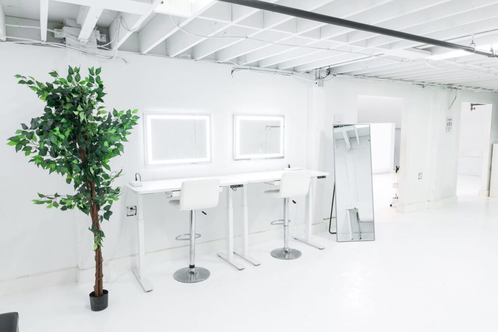Makeup area in an all-white production space