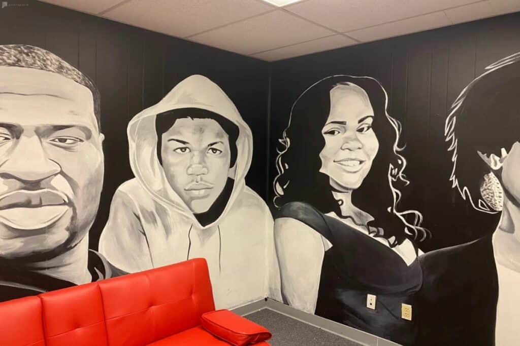 A creative art studio in Atlanta with murals on the walls