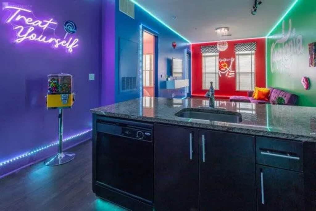 the kitchen of a neon loft 