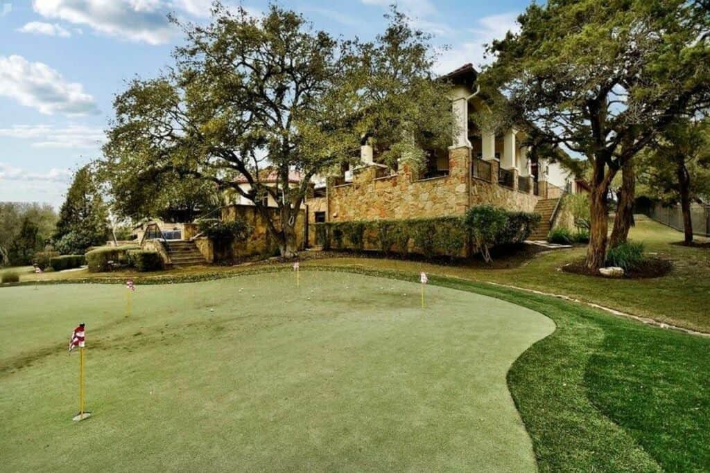 hill country mansion on golf course