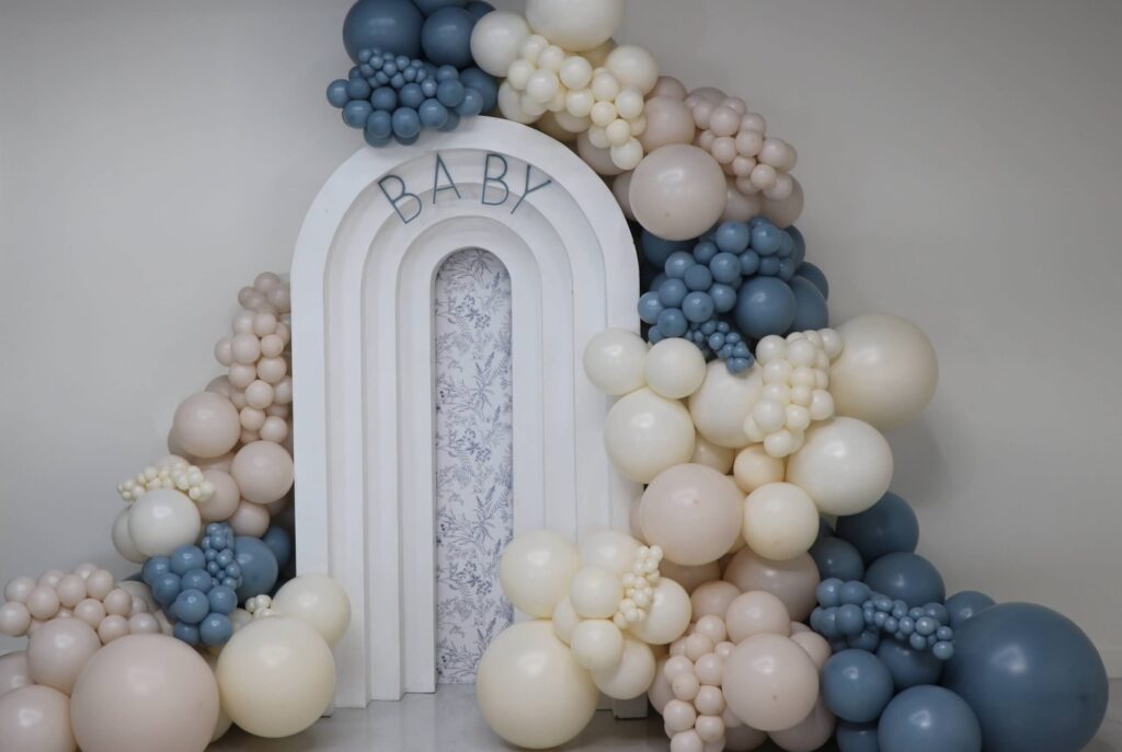 winter colors gender reveal arch