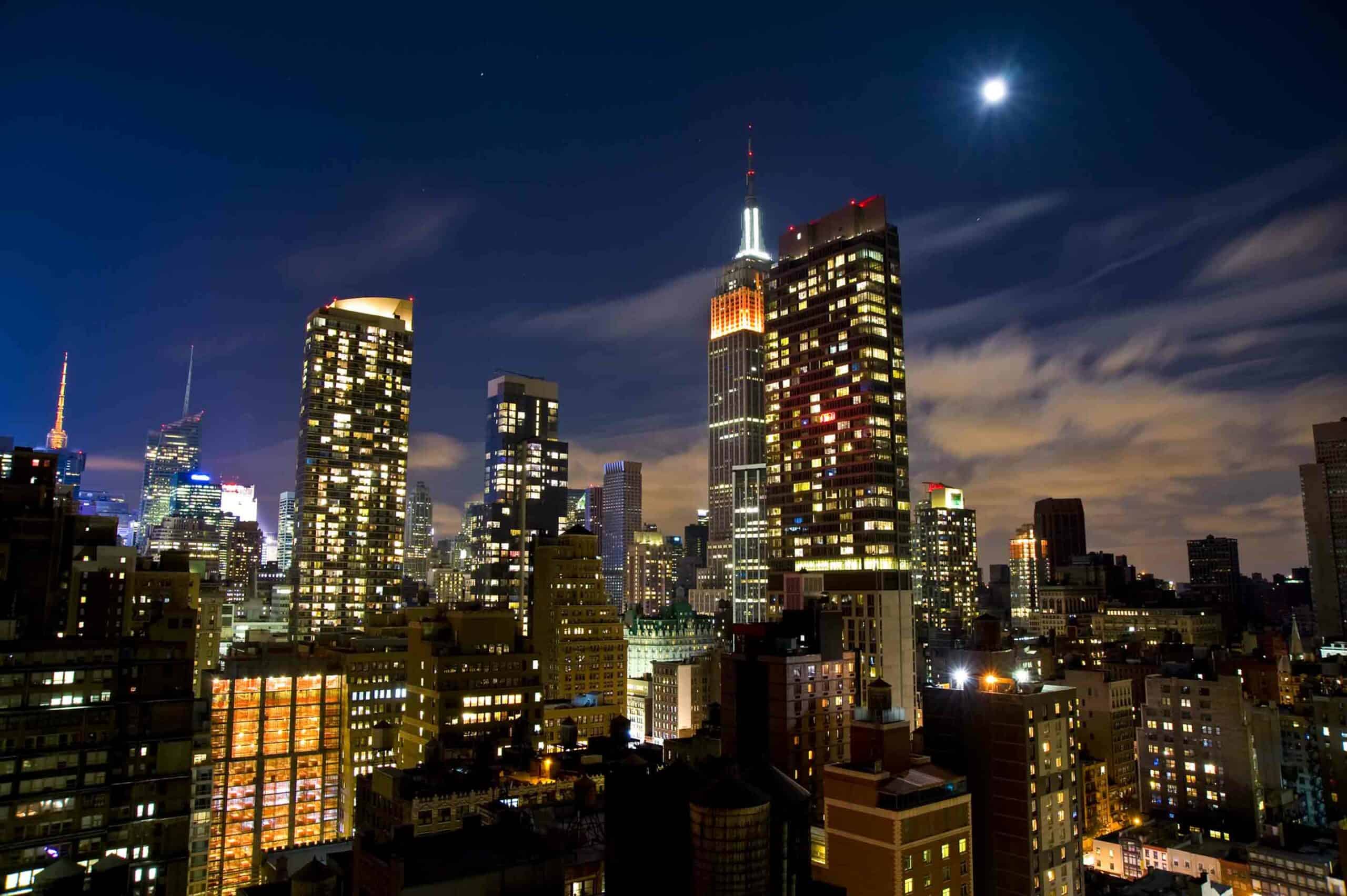 nighttime shot of NYC skyscrapers