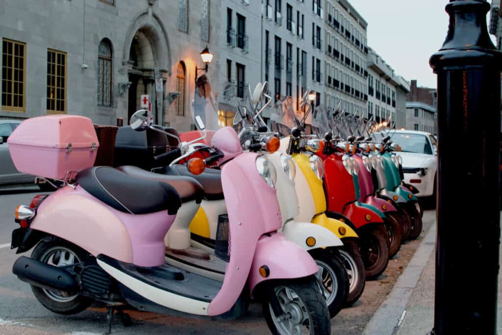 colorful vespa scooters on the street