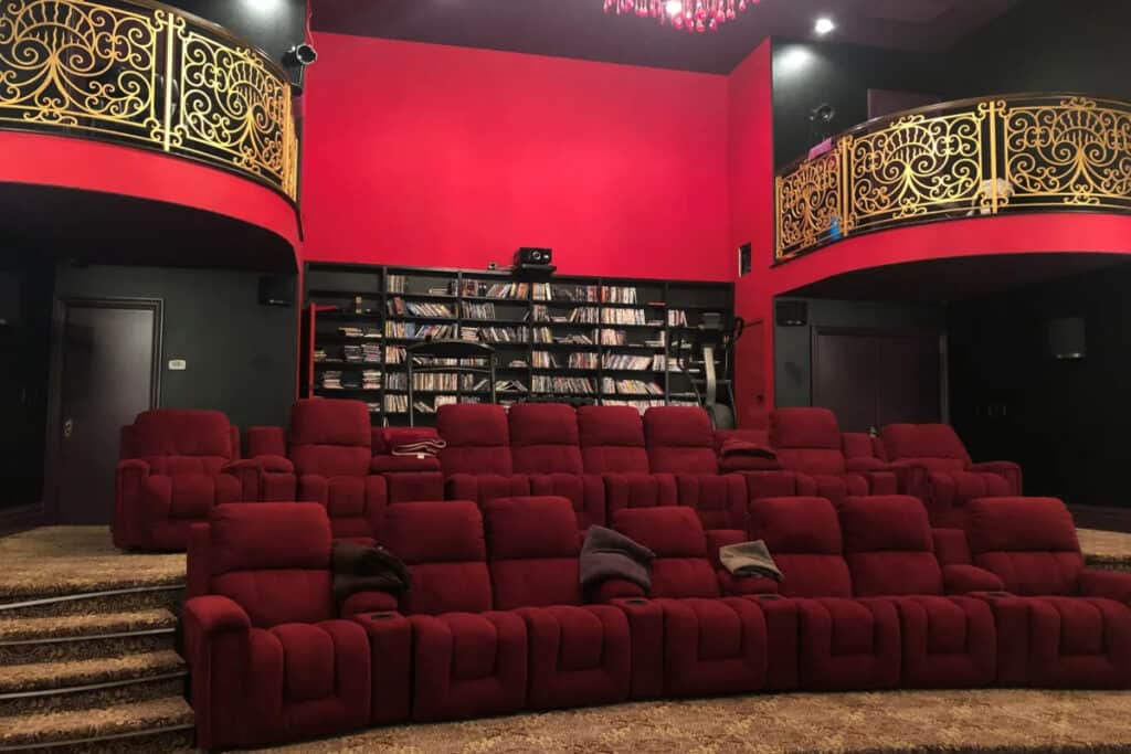 a private red and gold movie theater room