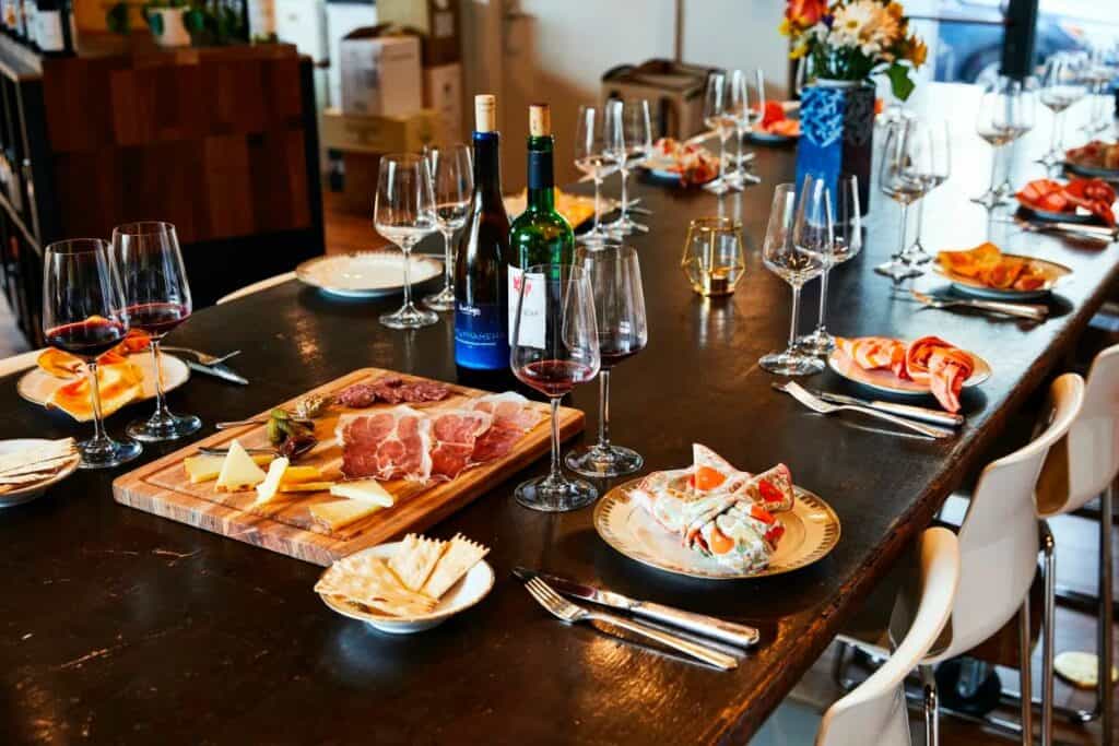 a meat and cheese charcuterie board in a wine shop