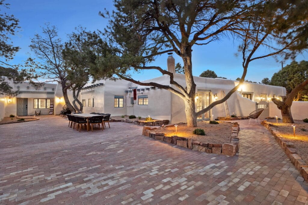 Large exterior courtyard at a traditional adobe house in New Mexico