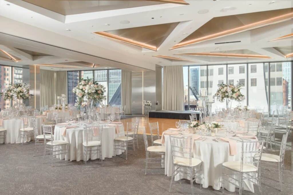 a classic all-white ballroom event space