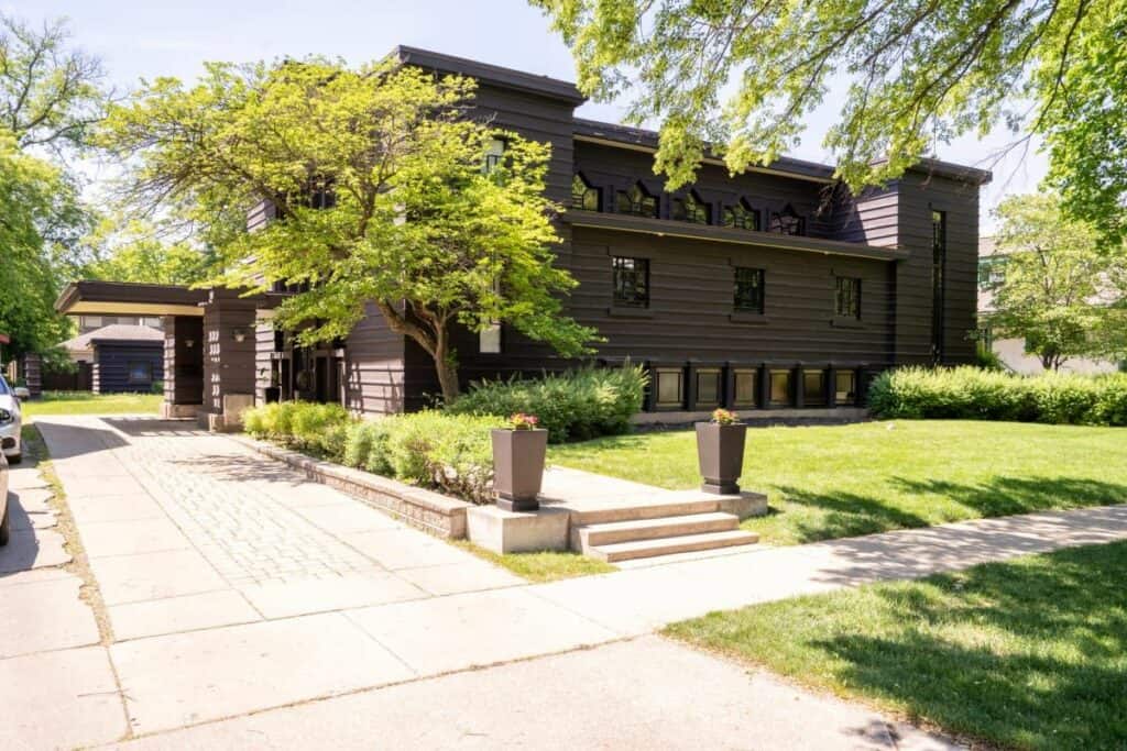 suburban home with garden and neat architecture