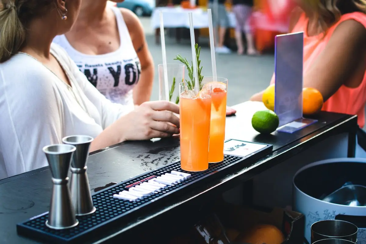 women-ordering-cocktails-at-festival-bar