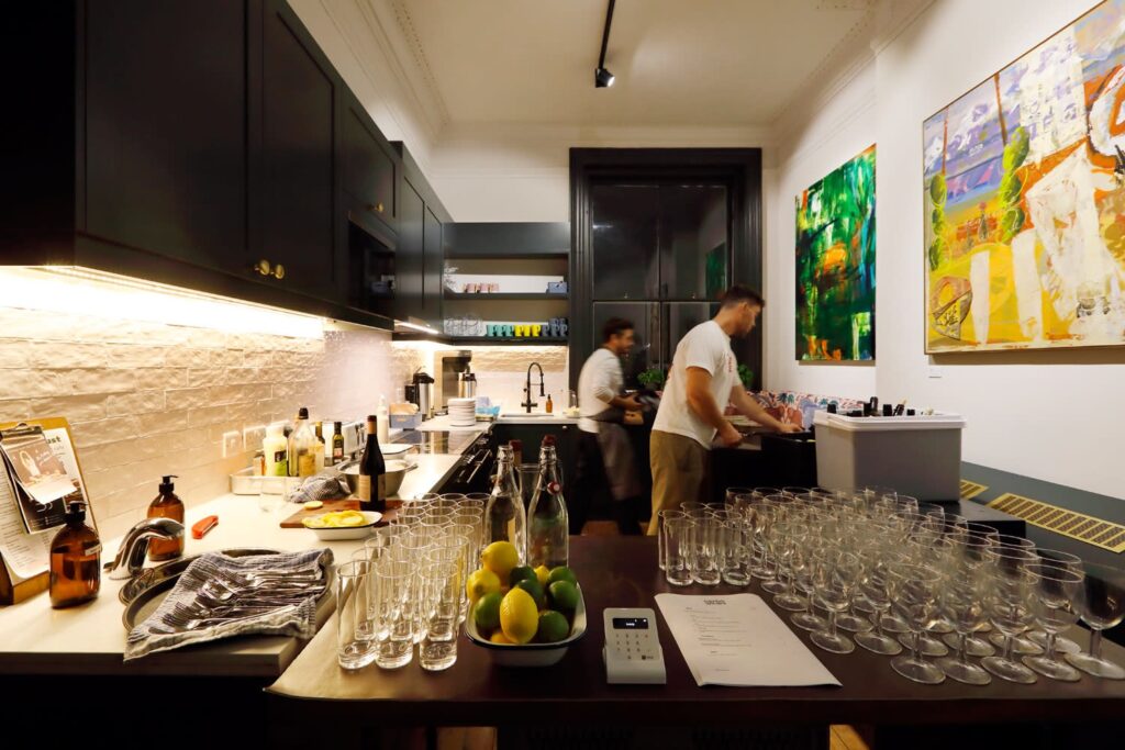 Sleek Dallas culinary event space prepared for corporate tasting experience