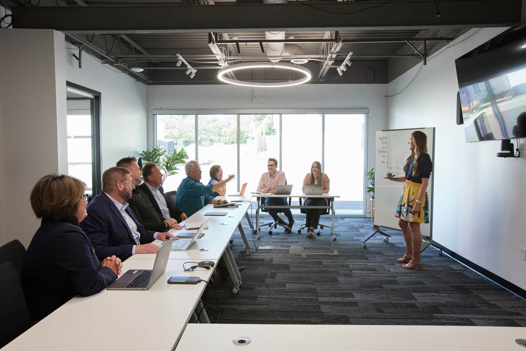 Corporate planners coordinating a polished business event space in Kansas City