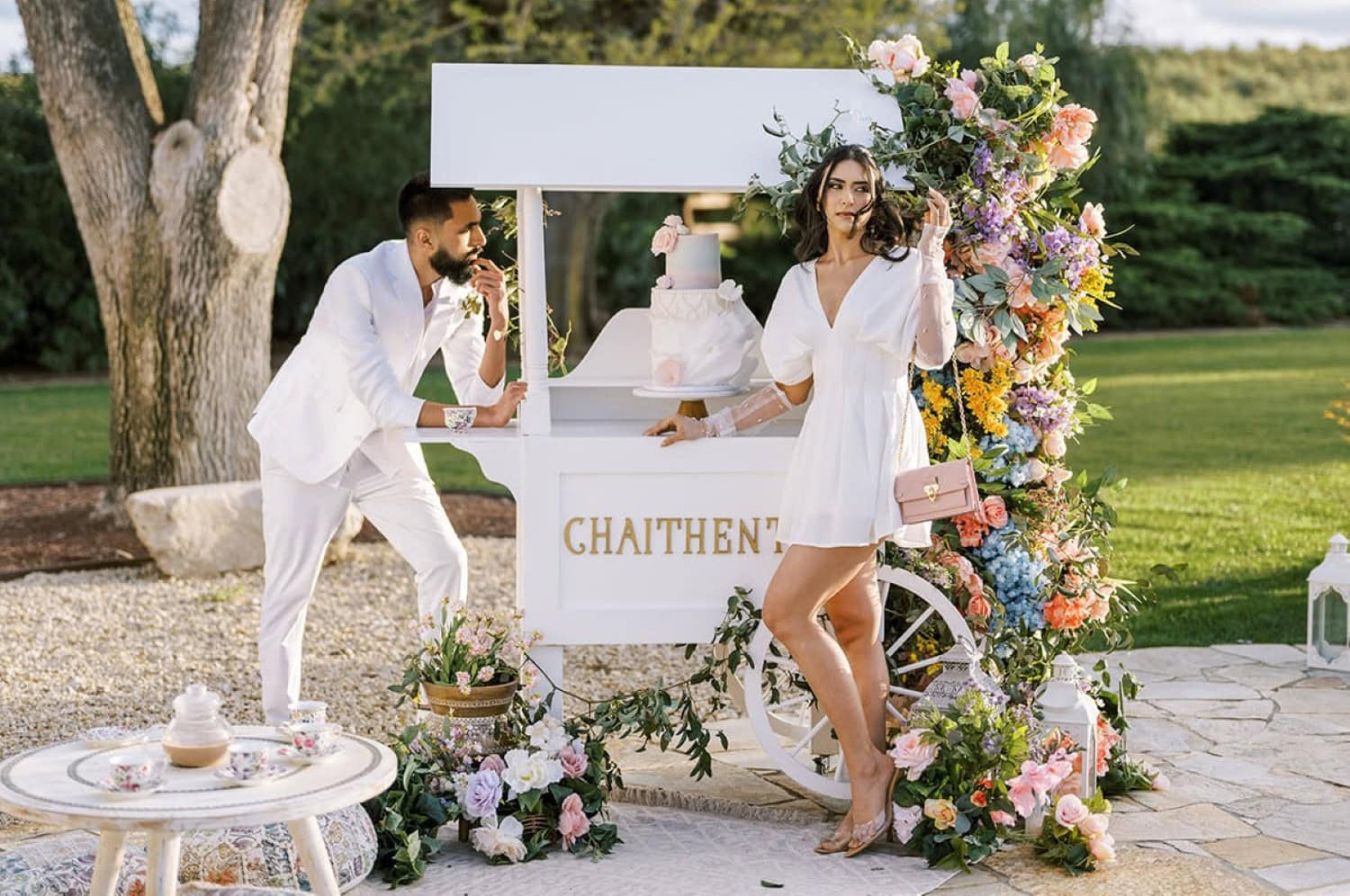 a couple at their outdoor engagement party
