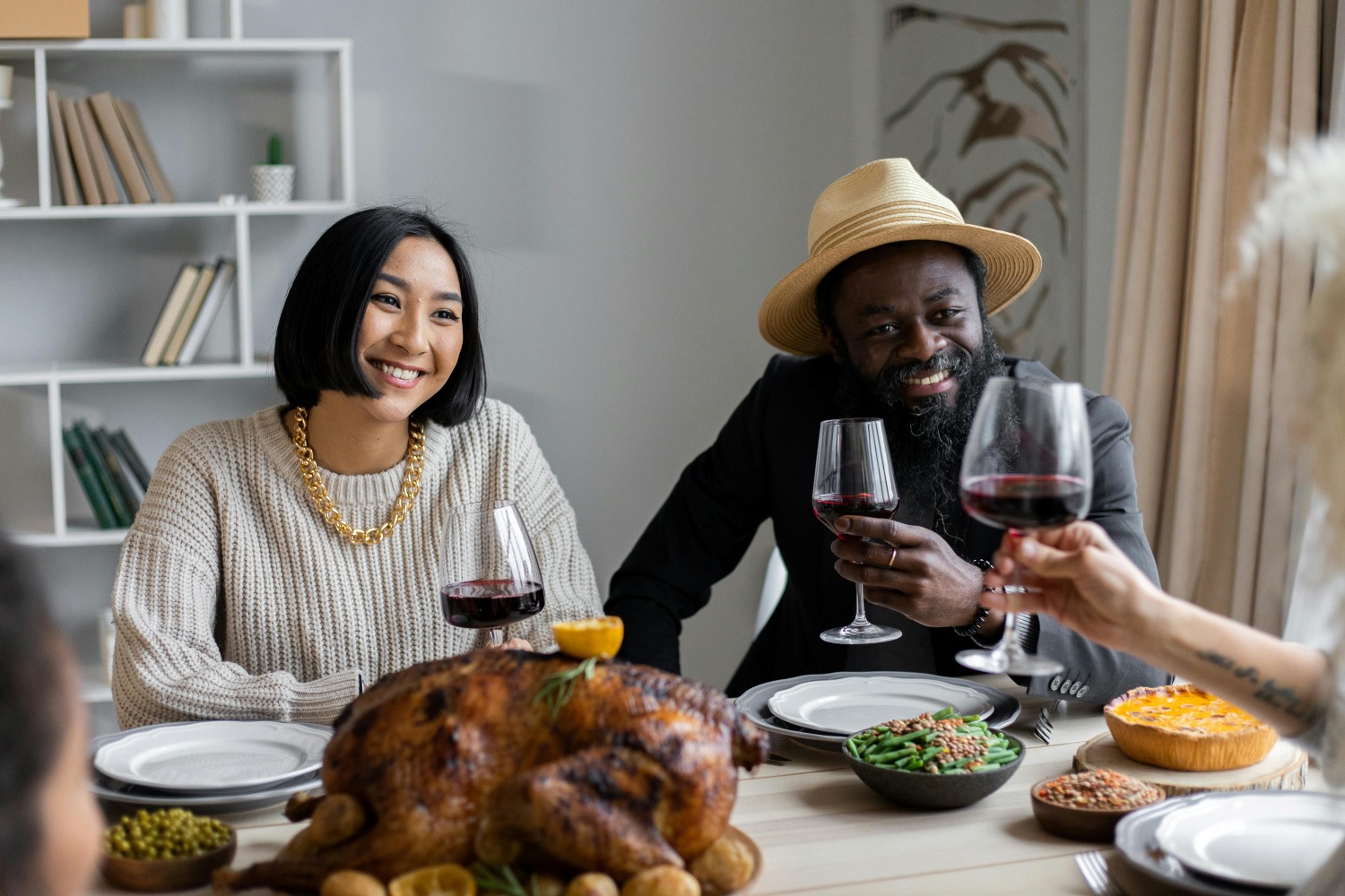 couple drinking wine at autumn dinner party