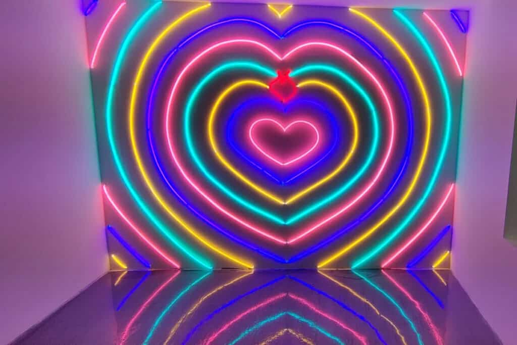 high fashion neon heart wall in dallas