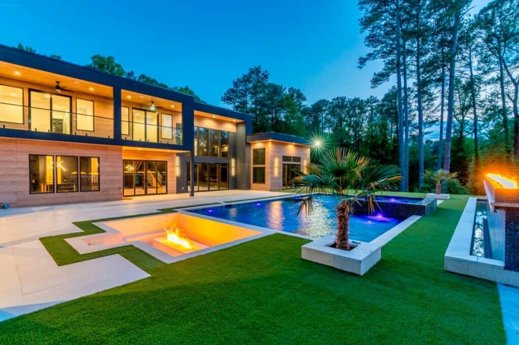 a huge mansion exterior in atlanta with a pool