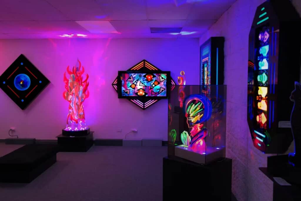 A moody, neon-lit art gallery in Denver