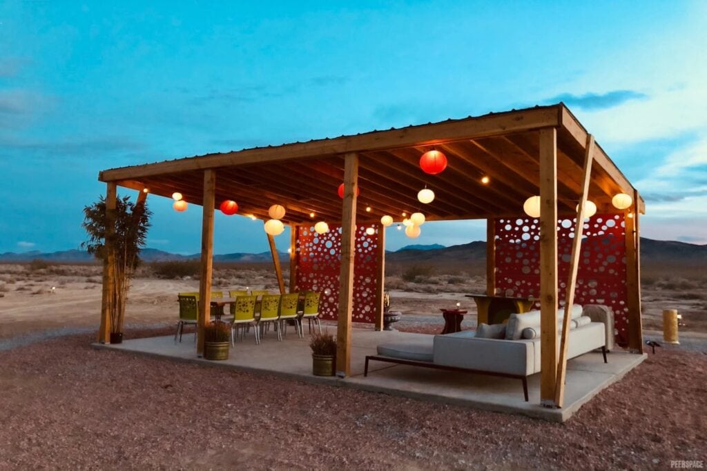 Small outdoor event space lit up by lanterns in Vegas