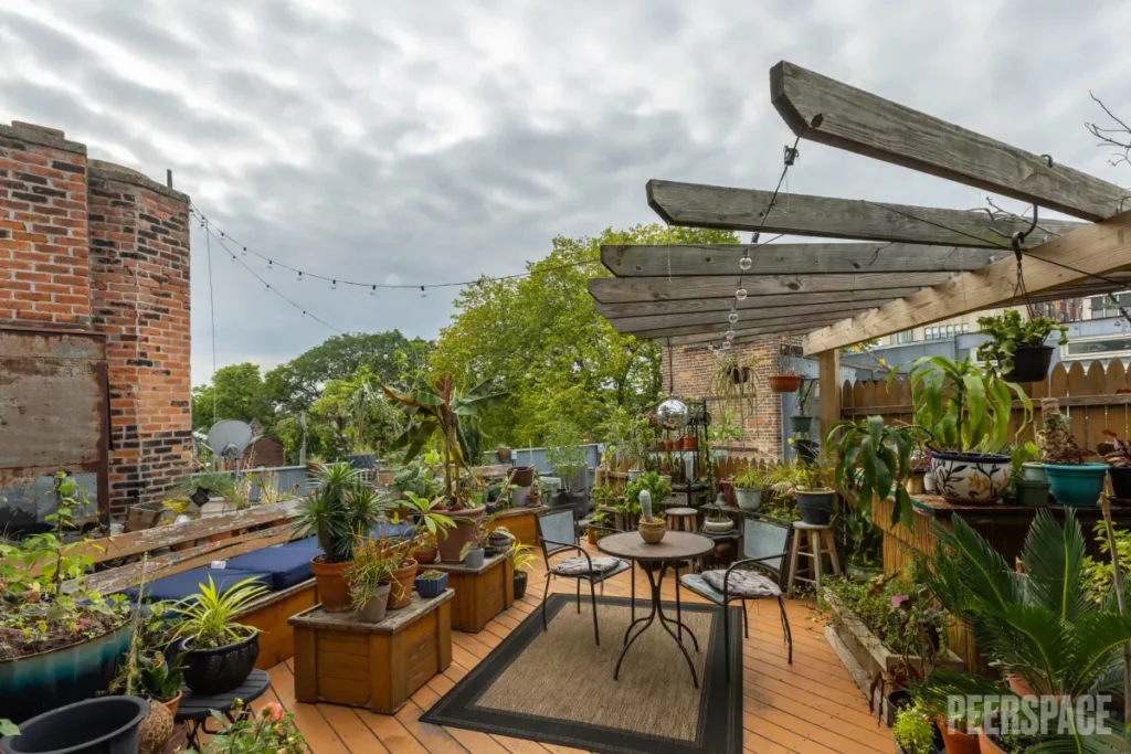 Lush Concrete Jungle Loft with Rooftop Patio