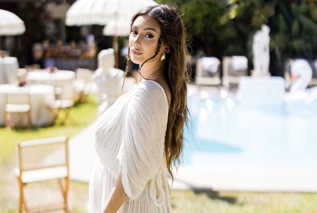 woman in white at outdoor baby shower