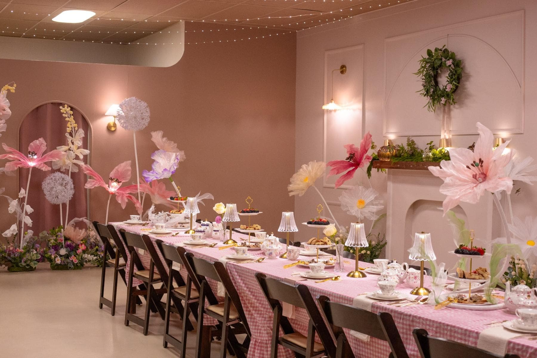 Styled California event dining table with floral installations and coordinated decor
