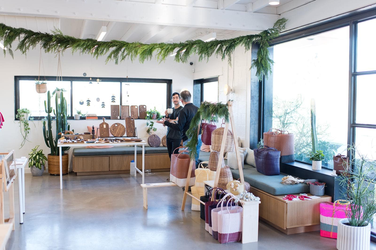 Charlotte event planner arranging floral details for a curated event