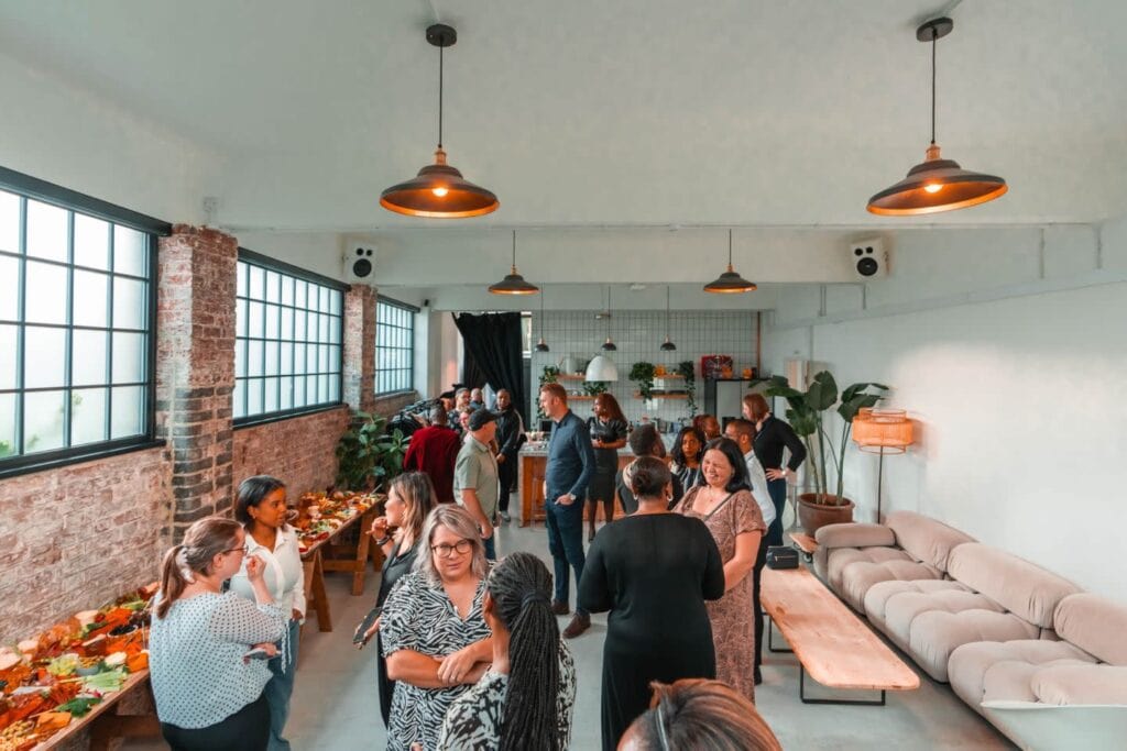 Lounge area with people gathered in event space in Chicago