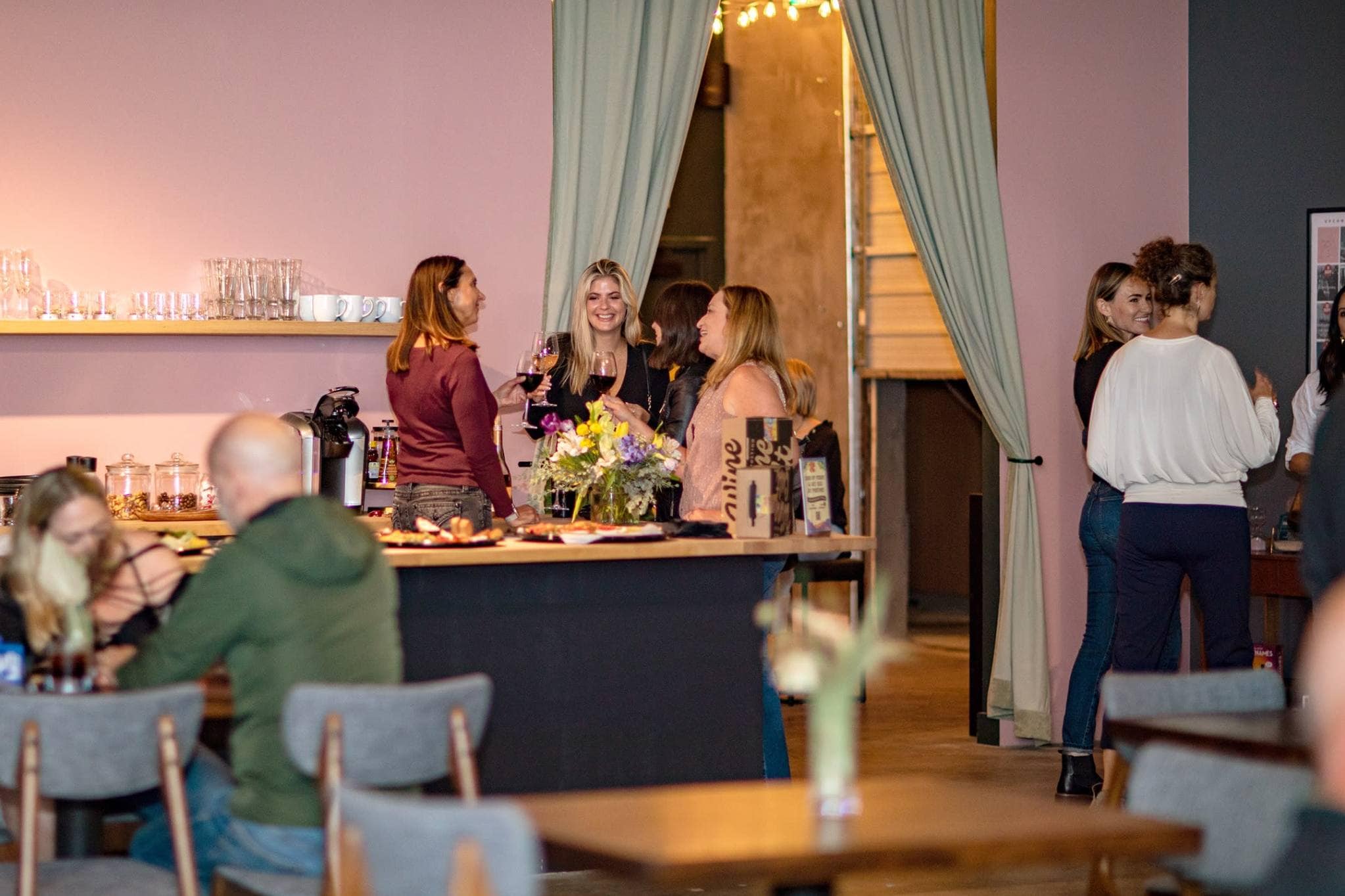 Guests socializing at a curated Denver indoor event venue