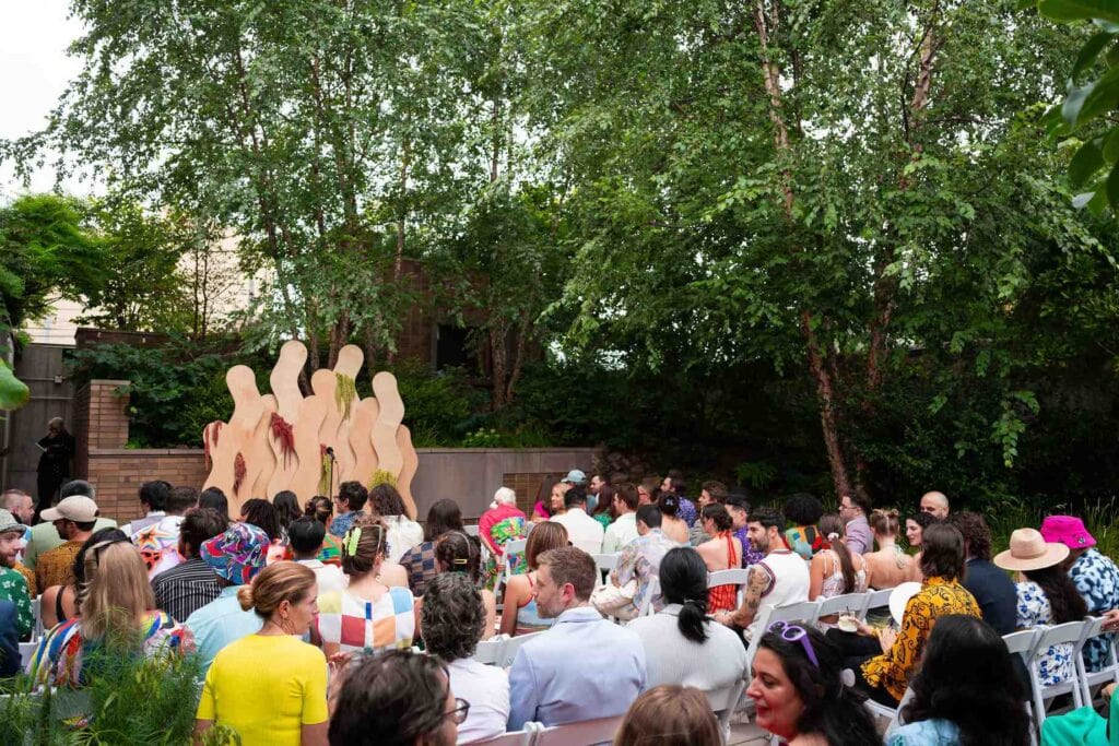 Outdoor event set up by Los ANgeles event planner with people sitting outside