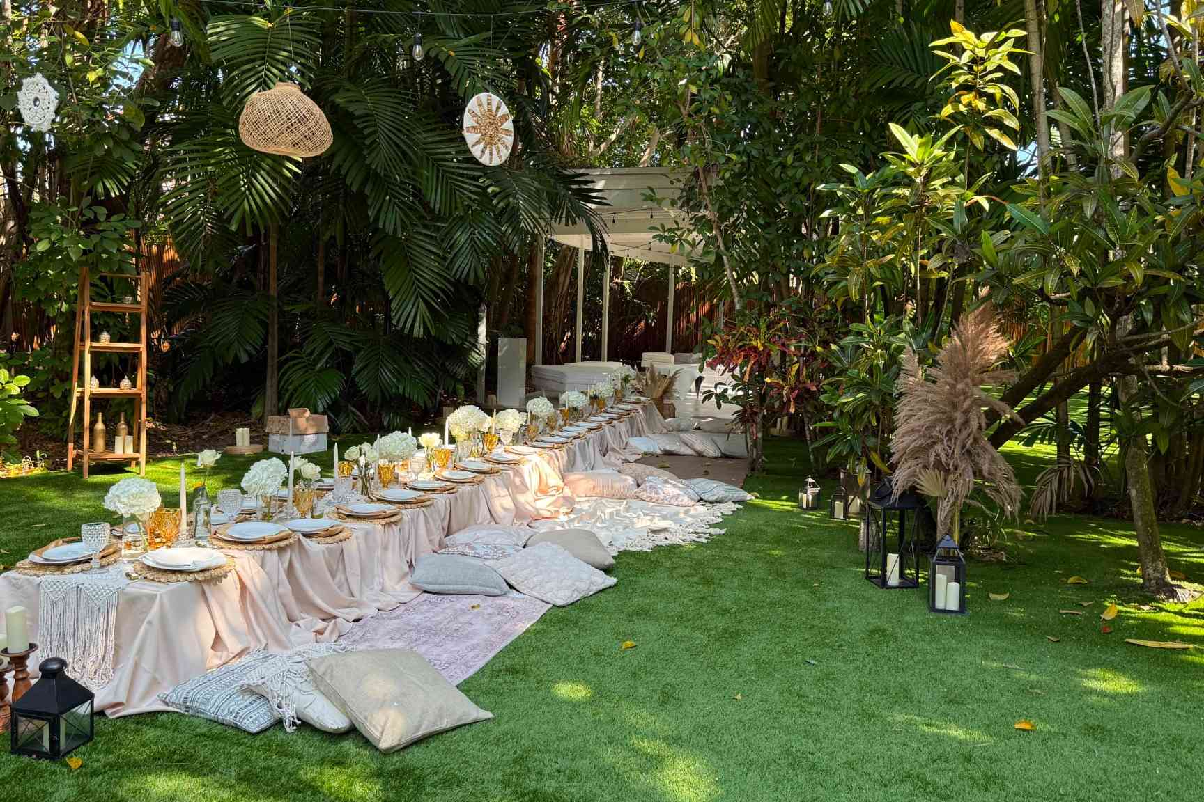 Upscale outdoor tablescape in tropical Miami garden setting