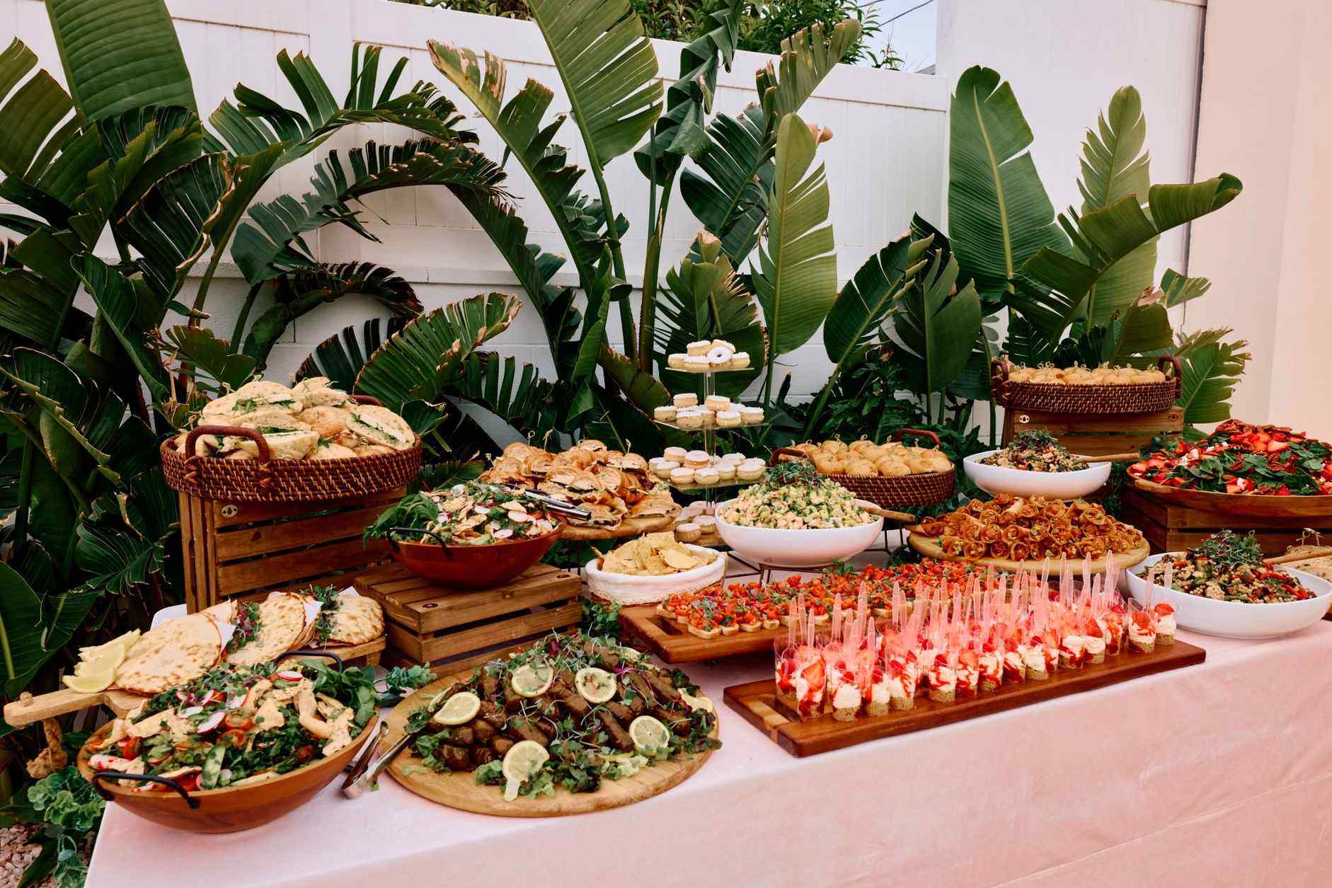Professional catering display with tropical styling for Miami events