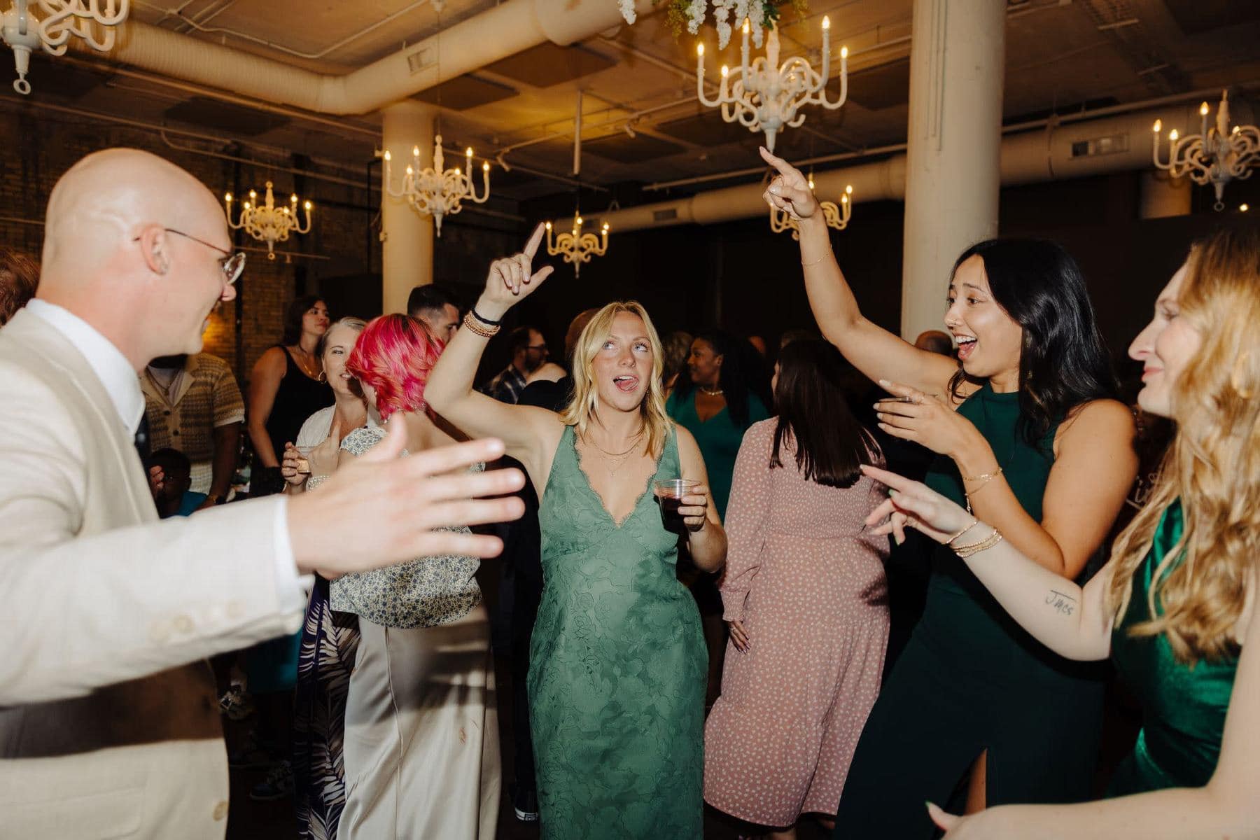 Well-dressed guests celebrating at a stylish Minneapolis event