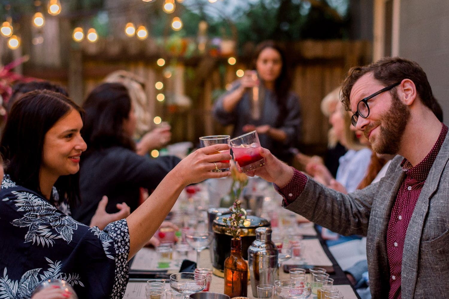Guests toasting at an outdoor Orlando evening event gathering
