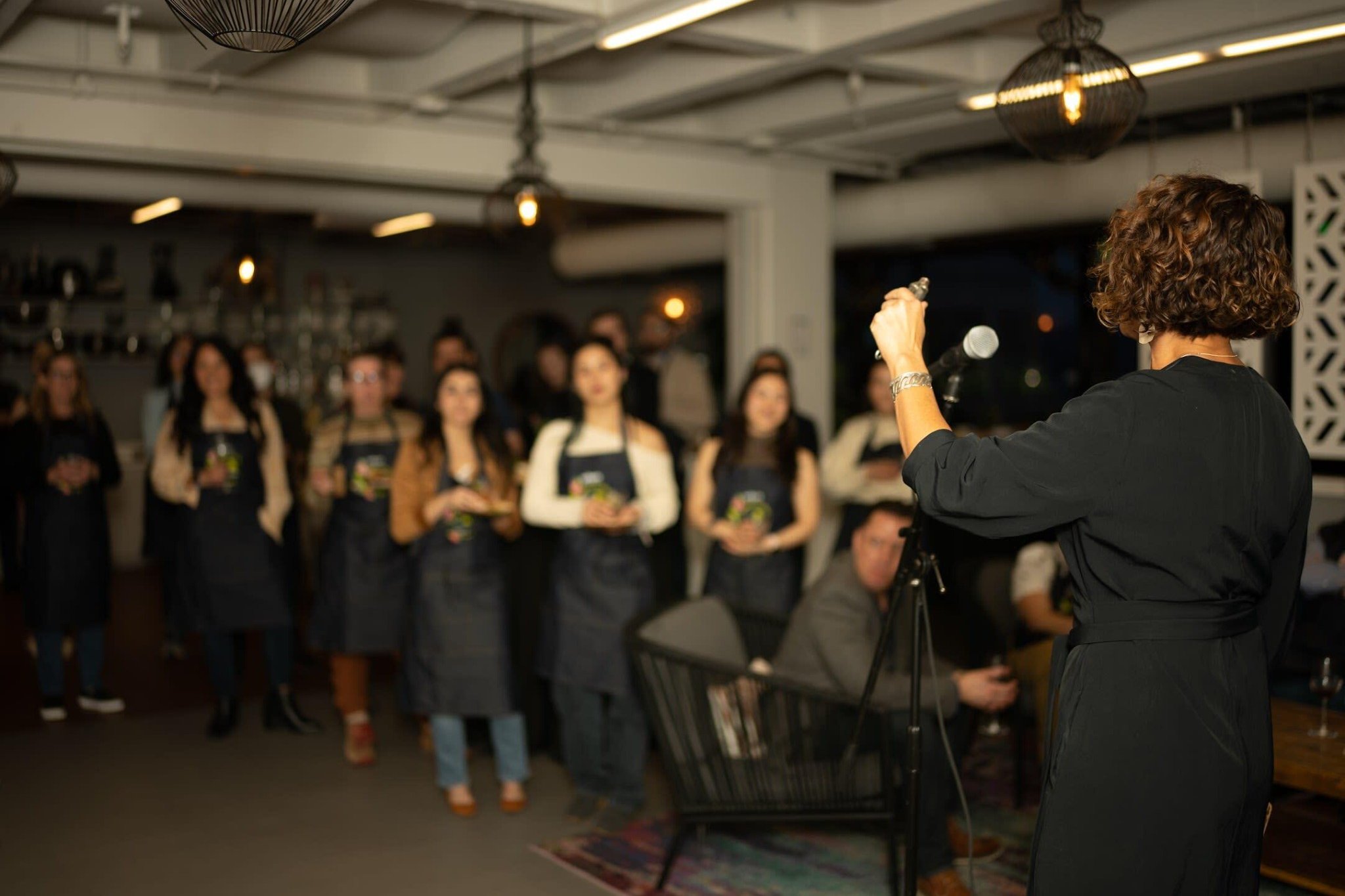 Speaker addressing attendees at a San Francisco event planning workshop