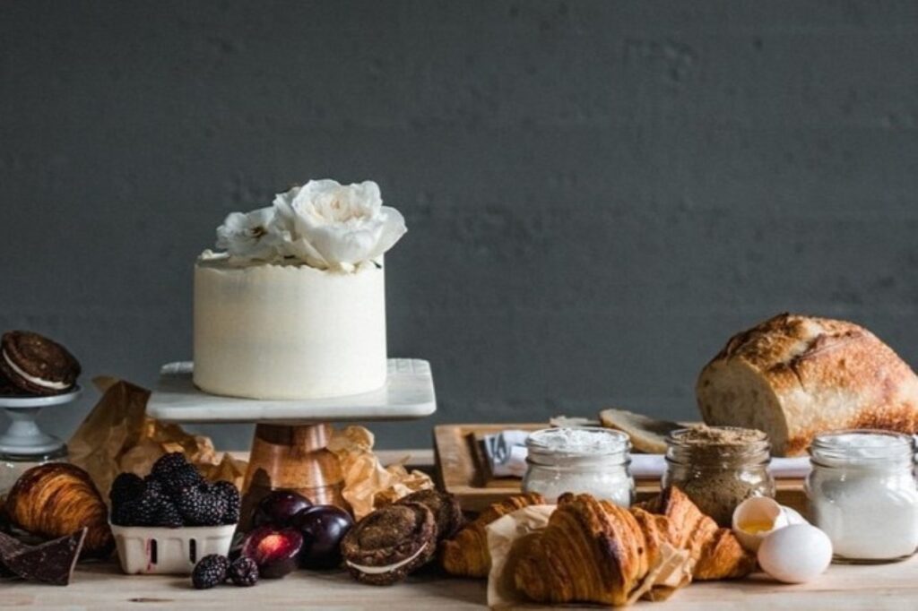 a table topped with desserts and breakfast foods