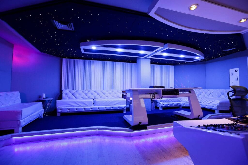 Neon lights illuminate a swanky recording studio