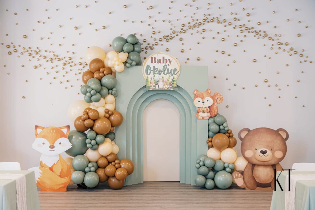 gender reveal decor with forest animal theme
