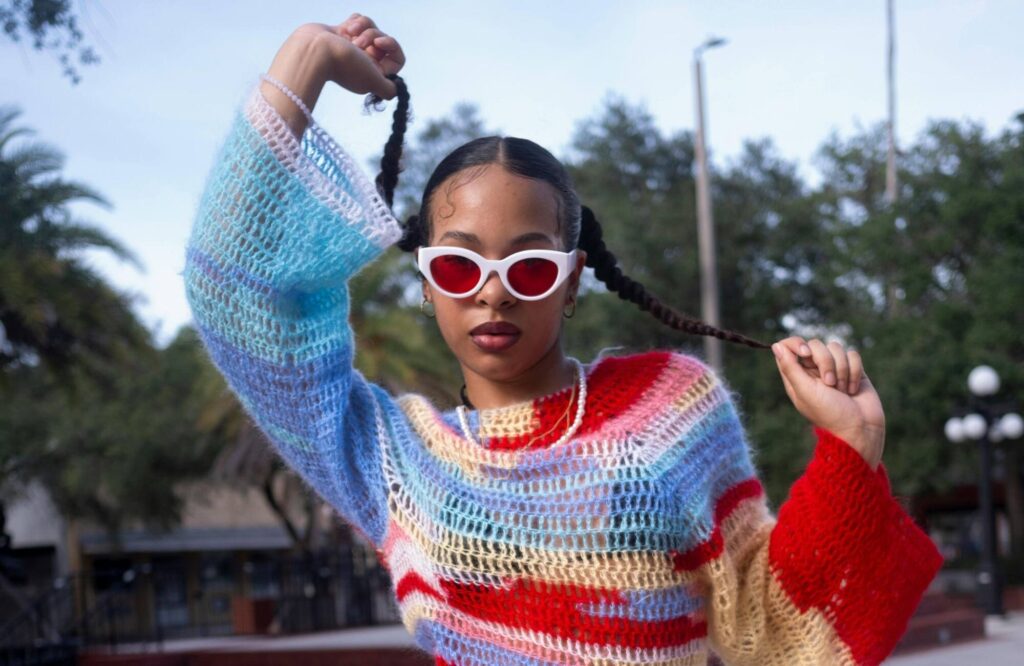a girl dressed in a y2k-inspired outfit