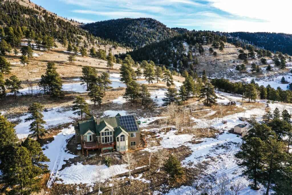 golden, co property with mountain views and alpaca